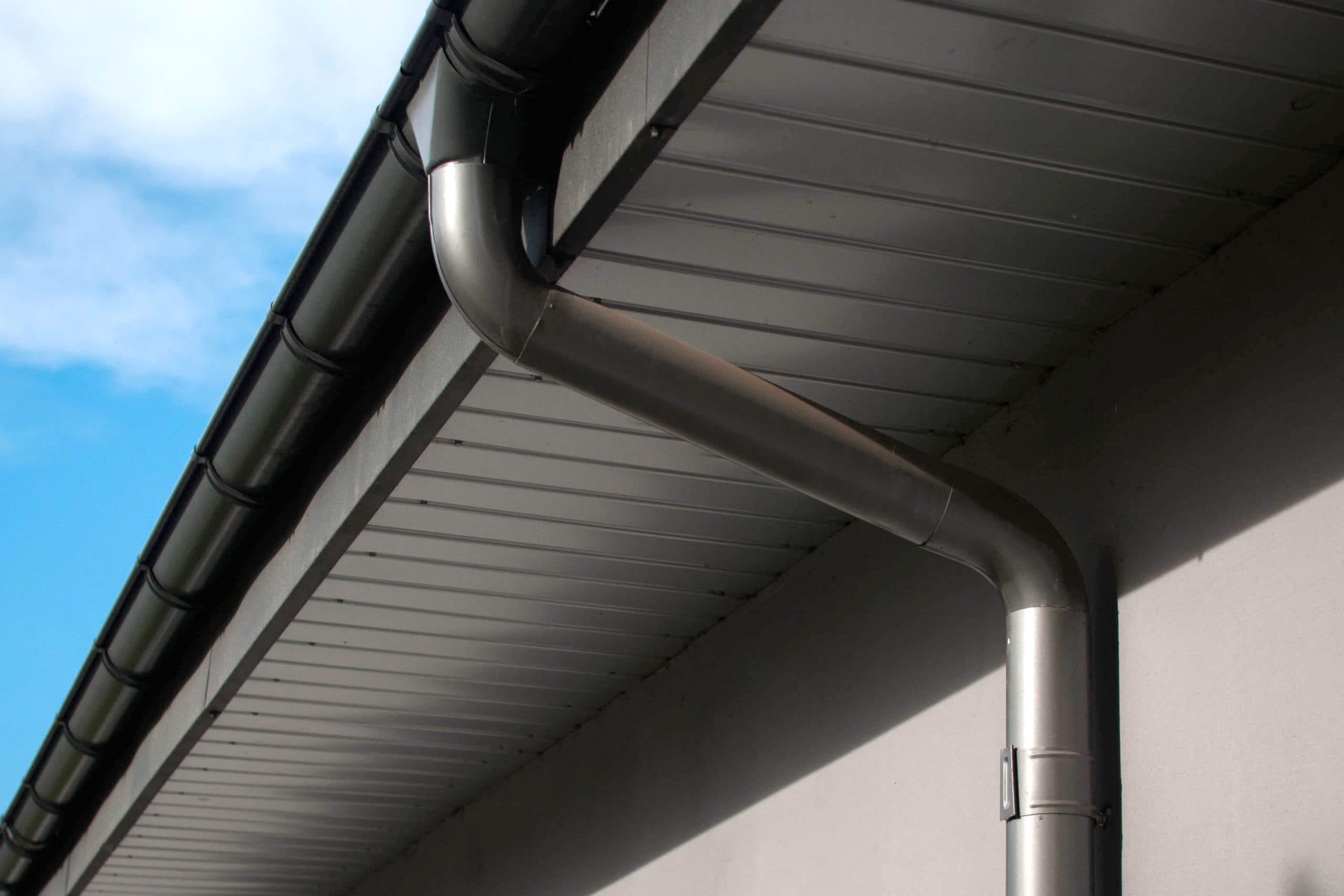 Corrosion-resistant galvanized gutters installed on a commercial building in Rock Hill